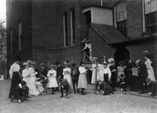 Grade school students of the Fifth Division studying measuring in front..., Washington DC, (1899?). Creator: Frances Benjamin Johnston