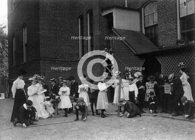 Grade school students of the Fifth Division studying measuring in front..., Washington DC, (1899?). Creator: Frances Benjamin Johnston.
