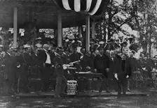 Graduation Day at Annapolis - cadet receiving his diploma from President Theodore Roosevelt, 1902. Creator: Frances Benjamin Johnston