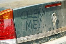 Graffiti on dirty Vauxhall Vectra 2003