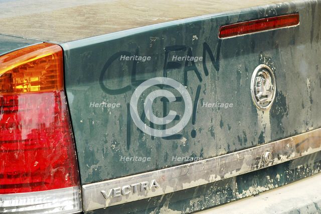 Graffiti on dirty Vauxhall Vectra 2003. Artist: Unknown.