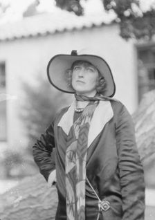 Graham, Mrs., standing outdoors, 1927 Creator: Arnold Genthe