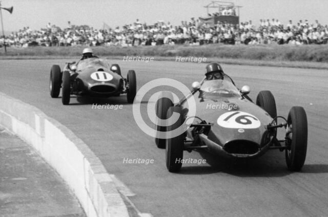 Graham Hill and Jack Brabham racing in the XI British Grand Prix, Silverstone, July 1958. Artist: Unknown