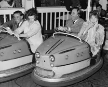 Graham Hill and Jim Clark on Dodgem cars at Butlins, Bognor Regis, 1960s