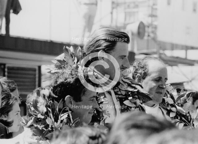 Graham Hill, Denny Hulme and Brian Redman, Spanish Grand Prix, 1968. Artist: Unknown