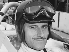 Graham Hill in cockpit of Lola T90, Indianapolis, 1966