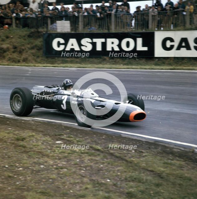 Graham Hill racing a BRM P261, British Grand Prix, Brands Hatch, Kent, 1966. Artist: Unknown