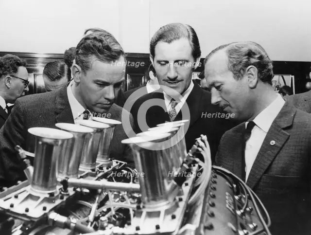 Graham Hill with Colin Chapman, c1967-c1970. Artist: Unknown