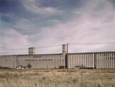 Grain elevators along the route of the Atchison, Topeka, and Santa Fe RR, Amarillo, Texas, 1943. Creator: Jack Delano