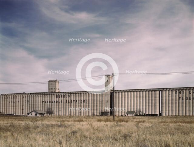 Grain elevators along the route of the Atchison, Topeka, and Santa Fe RR, Amarillo, Texas, 1943. Creator: Jack Delano.