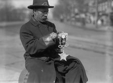 Grand Army of The Republic - G.A.R. Emblem Carved in Wood By Switchman at Peace Monument, 1917. Creator: Harris & Ewing