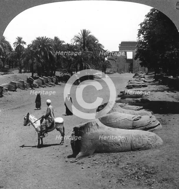 'Grand avenue approaching the Temple of Karnak, Thebes, Egypt', 1905.Artist: Underwood & Underwood