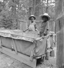 Grandchildren of tobacco sharecropper down at barns, Wake County, North Carolina, 1939. Creator: Dorothea Lange
