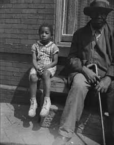 Grandfather and grandchild who live on Seaton Road, Washington, D.C, 1942. Creator: Gordon Parks