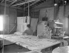 Grandmother from Oklahoma with grandson, working on quilt, California, Kern County, 1936. Creator: Dorothea Lange
