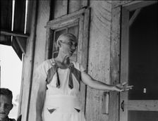 Grandmother of sharecropper family near Cleveland, Mississippi, 1937. Creator: Dorothea Lange