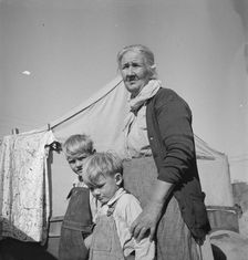 Grandmother of twenty-two children living in Kern County migrant camp, California, 1936. Creator: Dorothea Lange