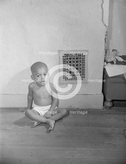 Grandson of Mrs. Ella Watson, a government charwoman, Washington, D.C., 1942. Creator: Gordon Parks.