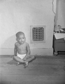 Grandson of Mrs. Ella Watson, a government charwoman, Washington, D.C., 1942. Creator: Gordon Parks