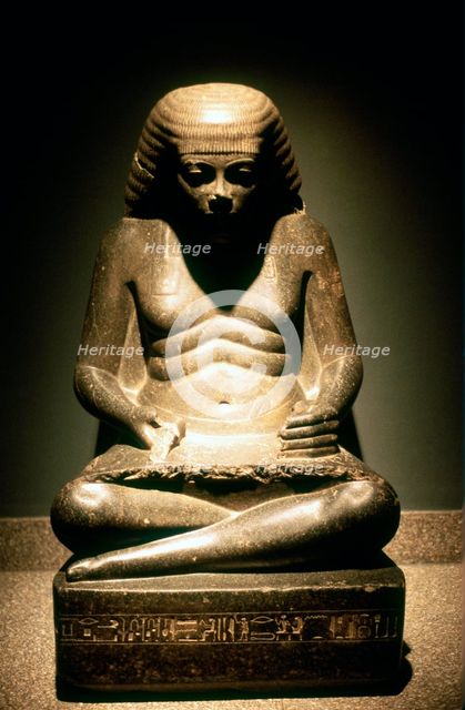 Granite statue of a seated Ancient Egyptian scribe, from Karnak, 17/18th dynasty, c1500 BC. Artist: Unknown