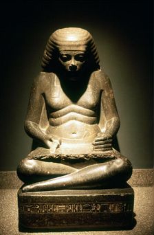 Granite statue of a seated Ancient Egyptian scribe, from Karnak, 17/18th dynasty, c1500 BC