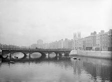 Grattan bridge on the River Liffey and the Ormond Quay Presbyterian Church, Dublin, Ireland, c1898. Creator: Robert Augustus Henry L'Estrange