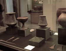 Grave goods of the archaeological site of El Argar (Almeria): well-crafted ceramic pieces, black …