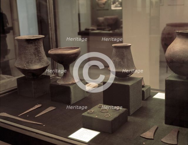 Grave goods of the archaeological site of El Argar (Almeria): well-crafted ceramic pieces, black …