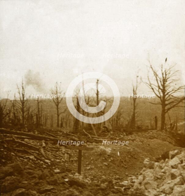 Graves and bombardment, Fleury, France, c1914-c1918. Artist: Unknown.