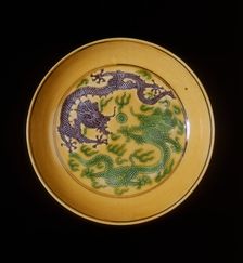 Green and aubergine dragons on yellow ground saucer, Guangxu period, Qing dynasty, China, 1875-1908