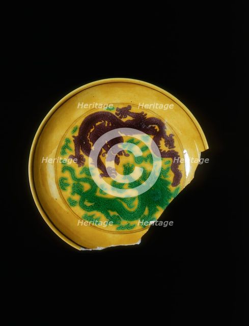 Green and aubergine imperial dragon saucer, Kangxi period, Qing dynasty, China, 1662-1722. Creator: Unknown.