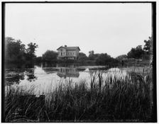 Green Lake, Wis., old mill at railway station, between 1880 and 1899. Creator: Unknown