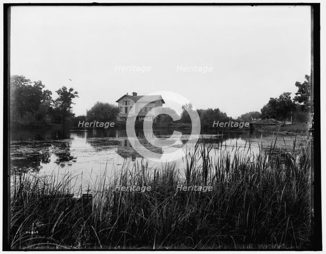 Green Lake, Wis., old mill at railway station, between 1880 and 1899. Creator: Unknown.