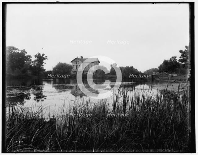 Green Lake, Wis., old mill at railway station, between 1880 and 1899. Creator: Unknown.