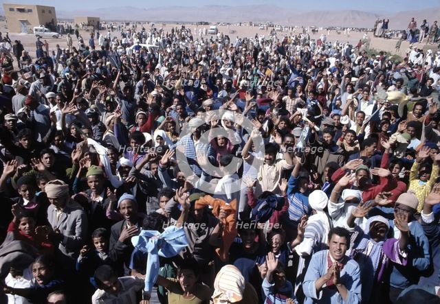 Green March, the Moroccan people led by their king go into the Sahara to protest for the self-det…