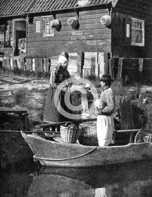 Greengrocer bringing goods by boat, Marken, Holland, 1936. Artist: Donald McLeish