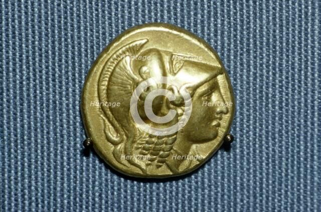 Greek Coin, Head of Athena on a gold stater of Alexander the Great, 336-323 BC. Artist: Unknown.