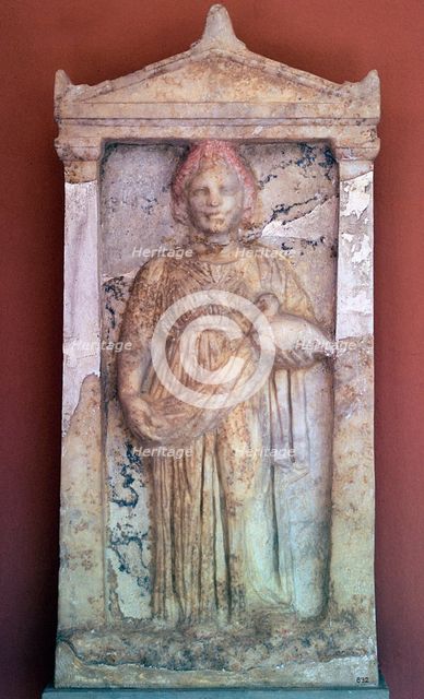 Greek stele of a girl holding a bird, 4th century BC. Artist: Unknown