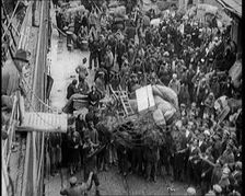 Greek People Jostling for Red Cross Food Hand Outs, 1922. Creator: British Pathe Ltd