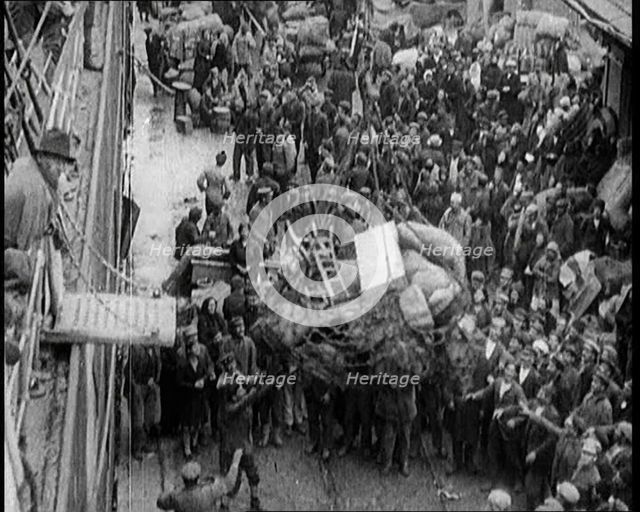 Greek People Jostling for Red Cross Food Hand Outs, 1922. Creator: British Pathe Ltd.