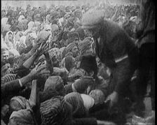 Greek People Jostling for Red Cross Food Hand Outs, 1922. Creator: British Pathe Ltd