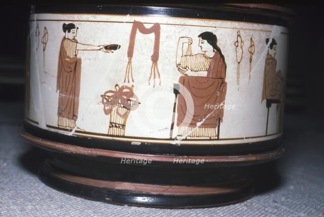 Greek Pyxis, (Cosmetic Box), Women performing domestic tasks, Athens, c460BC-450 BC. Artist: Unknown.