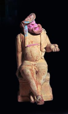 Greek terracotta vessel of a comic actor, 2nd century BC