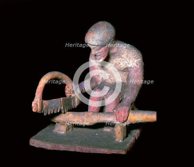 Greek terracotta figure of a man sawing wood, 6th century BC. Artist: Unknown