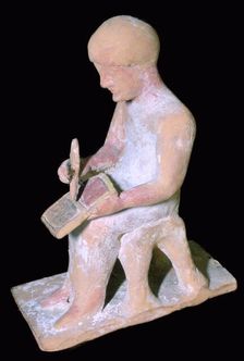 Greek terracotta of a man writing