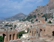 Greek theatre and town, Taormina, Sicily, Italy. Creator: Peter Thompson