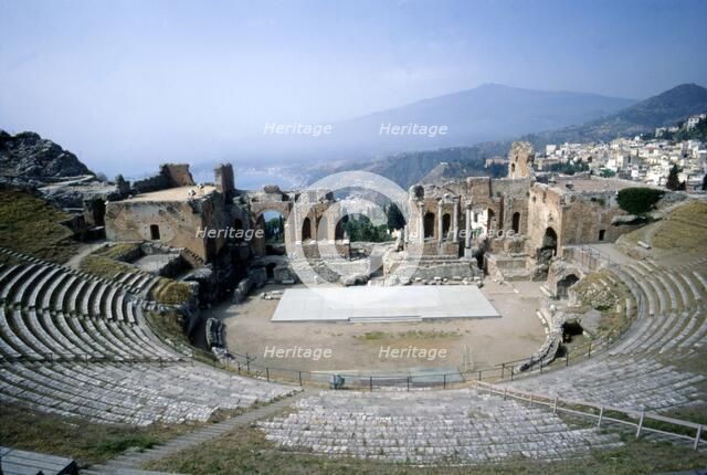 GreekGreek Ampitheatre, seashore and Mt Etna, Taormina, Sicily, 3rd century, (c20th century).  Artist: Unknown.