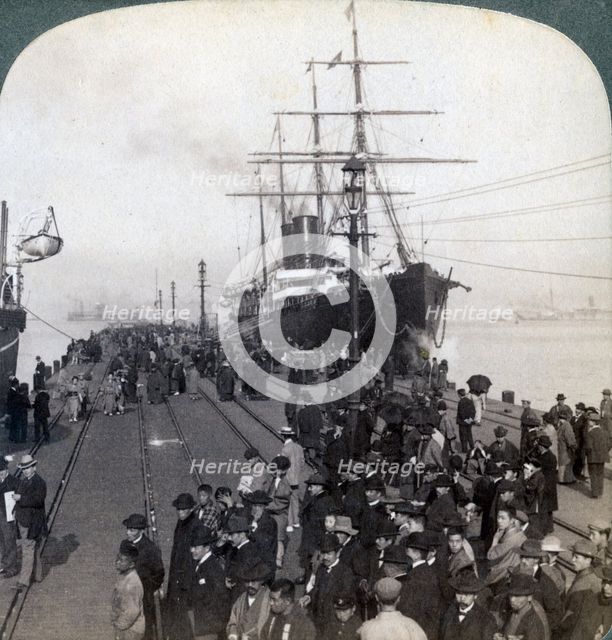 Greetings for newcomers on the pier alongside the Pacific Mail SS 'China, at Yokohama, Japan, 1904.Artist: Underwood & Underwood