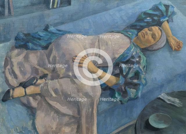 Grete Gamerith on a blue couch, 1936. Creator: Walther Gamerith.