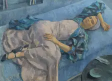Grete Gamerith on a blue couch, 1936. Creator: Walther Gamerith